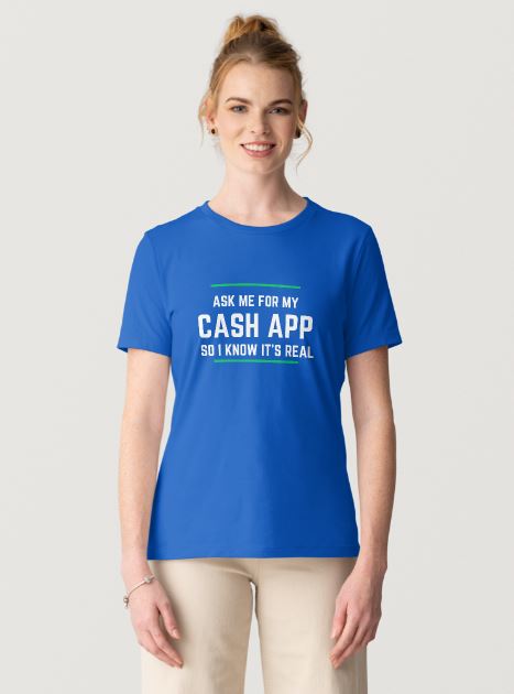 Person wearing a blue t-shirt with text 'Ask me for my Cash App so I know it's real' on a plain background